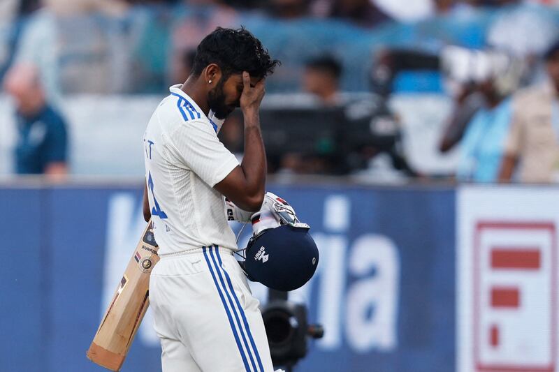 India's Srikar Bharat looks dejected as he walks back to the pavilion after losing his wicket to Tom Hartley. Reuters
