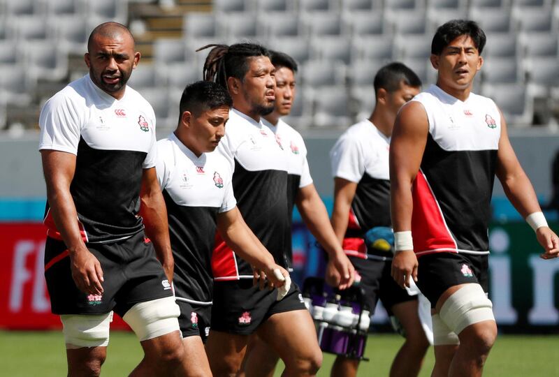 Rugby Union - Rugby World Cup - Japan's Captain's Run - Tokyo Stadium, Tokyo, Japan - September 19, 2019. Japan team captain Michael Leitch and other teammates attend a training session. REUTERS/Issei Kato