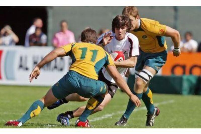 Jonny MacDonald, centre, in action for the now defunct Arabian Gulf side, qualifies to play for Scotland.