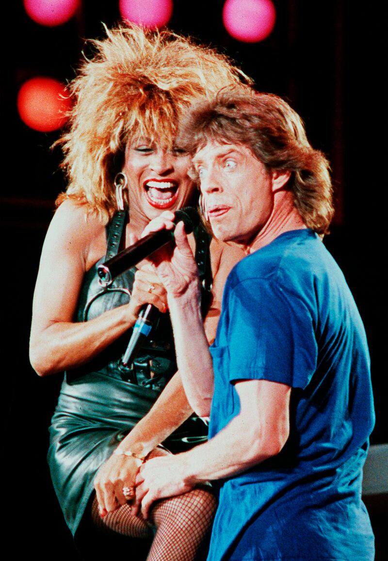Turner and Rolling Stones front man Mick Jagger perform at the Live Aid concert in Philadelphia in 1995. AP