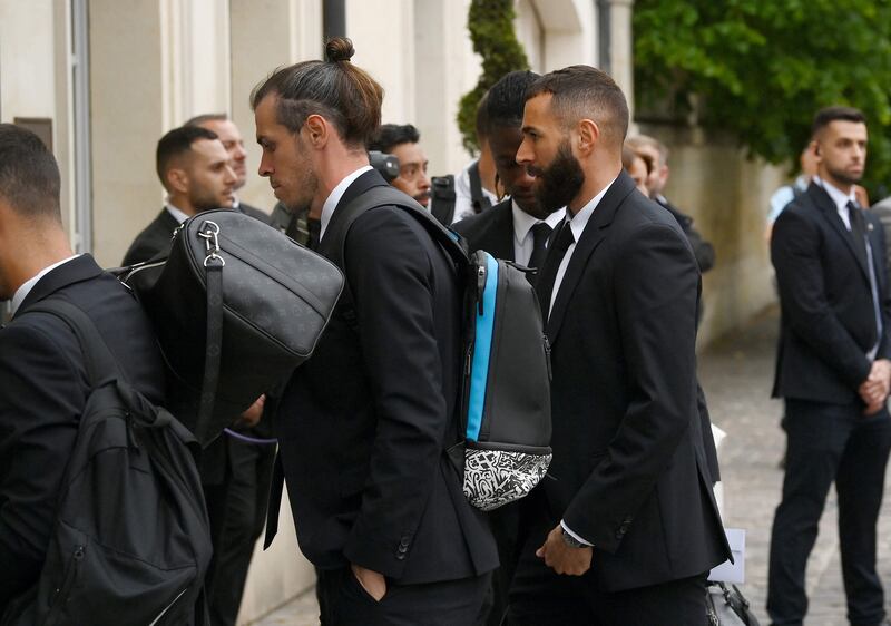 Real Madrid's Gareth Bale and Karim Benzema arrive at the team hotel. AFP