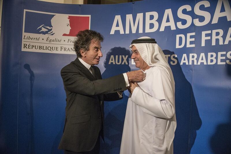 Dr.Zaki Nusseibeh (R), is decorated with the Légion d’honneur in the Residence of France in Abu Dhabi by Jack Lang (L), Former French Minister of Culture and Current President of the Institute of the Arab World. Vidhyaa for The National