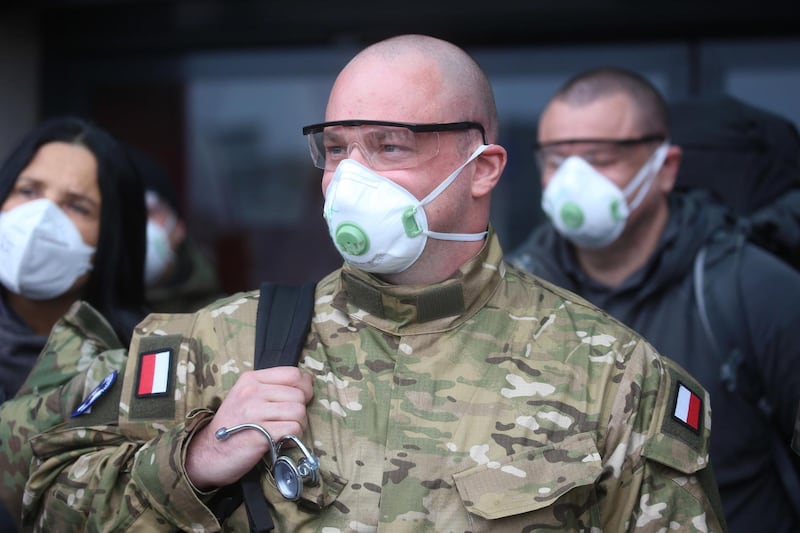 A group of Polish doctors arrive at Bergamo's Airport to reach Brescia's hospitals to help Italian doctors to fight the coronavirus pandemic, in Bergamo, northern Italy. EPA