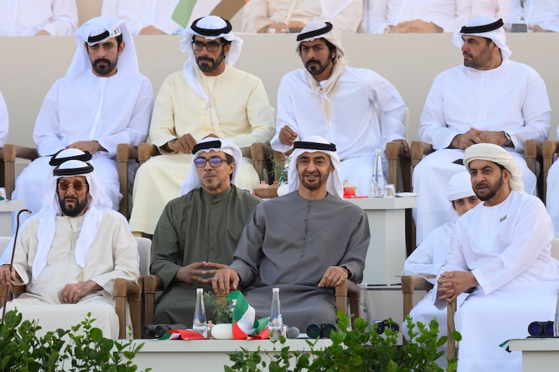 Sheikh Mohamed with Sheikh Mansour bin Zayed, Deputy Prime Minister and Minister of the Presidential Court; Sheikh Tahnoon bin Mohamed, Ruler's Representative in Al Ain Region; and Sheikh Hamdan bin Zayed, Ruler’s Representative in Al Dhafra Region, watch the Union Parade, during the Sheikh Zayed Heritage Festival. 
Abdulla Al Neyadi /  Presidential Court