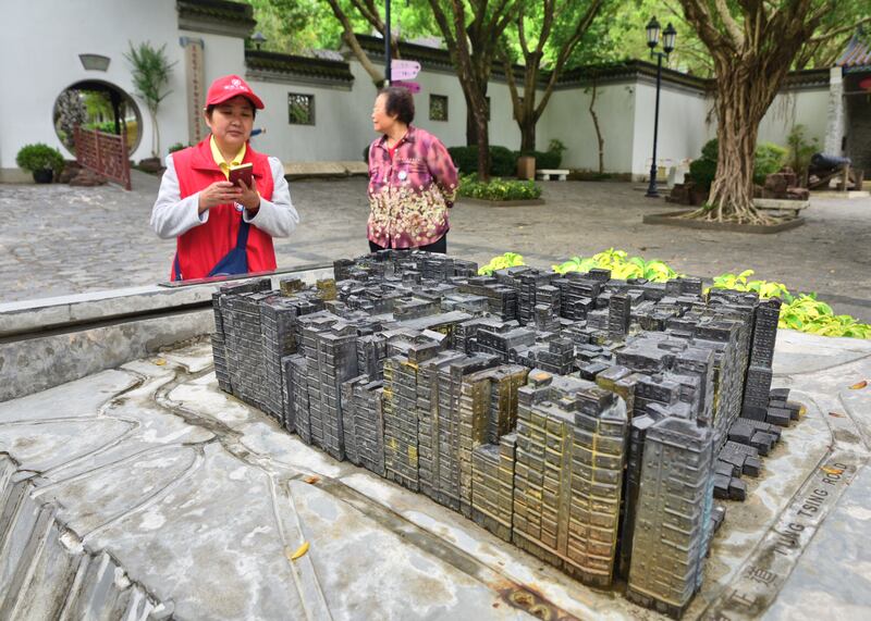 A scaled model of the colossal housing complex that existed in Kowloon Walled City Park until 1994 