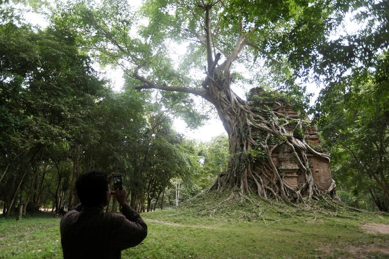 A tourist visits Sambor Prei Kuk. It has been listed as a UNESCO world heritage site. Samrang Pring / Reuters