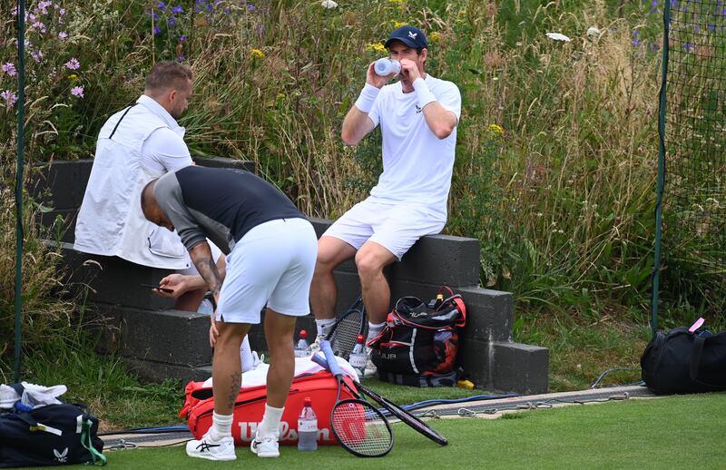 Andy Murray takes a break during practice. EPA