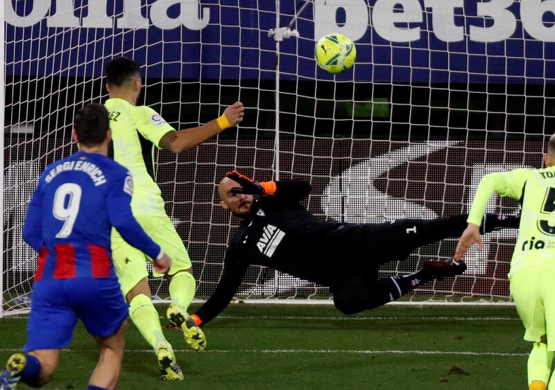 Atletico forward Luis Suarez scores his last-gasp winner from the spot. EPA