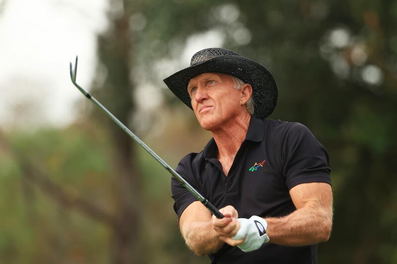 ORLANDO, FLORIDA - DECEMBER 20: Greg Norman of Australia plays his shot from the fourth tee during the final round of the PNC Championship at the Ritz-Carlton Golf Club Orlando on December 20, 2020 in Orlando, Florida.   Mike Ehrmann/Getty Images/AFP
== FOR NEWSPAPERS, INTERNET, TELCOS & TELEVISION USE ONLY ==
