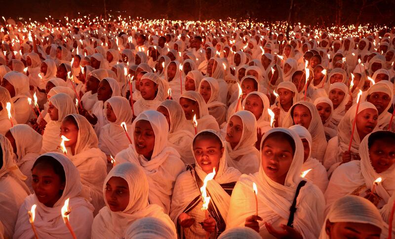 Ethiopian Orthodox faithful during a Christmas Eve celebration at Bole Medhanialem Church in Addis Ababa, Ethiopia. Reuters