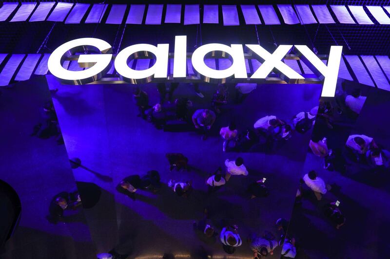 Samsung Galaxy signage hangs on the ceiling during the launch. AFP