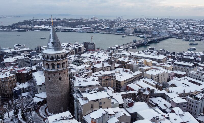 Galata Tower and the Golden Horn during heavy snowfall in Istanbul. Reuters