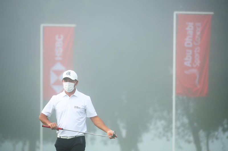 Ashun Wu of China putts on the practice green during practice at Abu Dhabi Golf Club. Getty Images