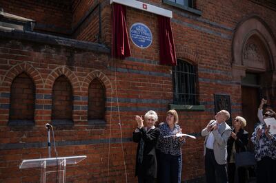 Actress Anita Dobson (L), unveils a blue plaque dedicated to the matchgirls strike at the former Bryant and May match factory on July 5, 2022 in London. The strike of 1888 was an industrial action by the women and teenage girls working at the Bryant and May match factory in Bow, London. It encouraged other working-class labour activists to set up unskilled worker unions, an era that became known as New Unionism. Getty 