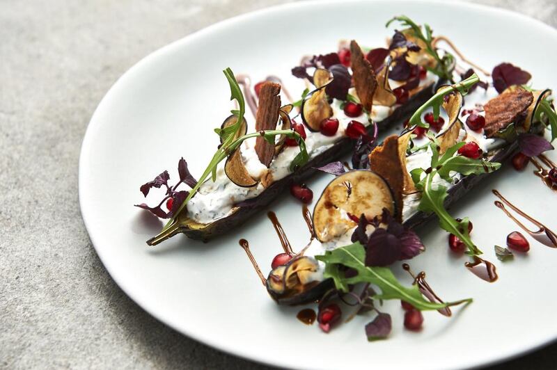 Aubergine with labneh and pomegranate, which is available at Molecule restaurant in Dubai’s D3 Design District. Courtesy Molecule