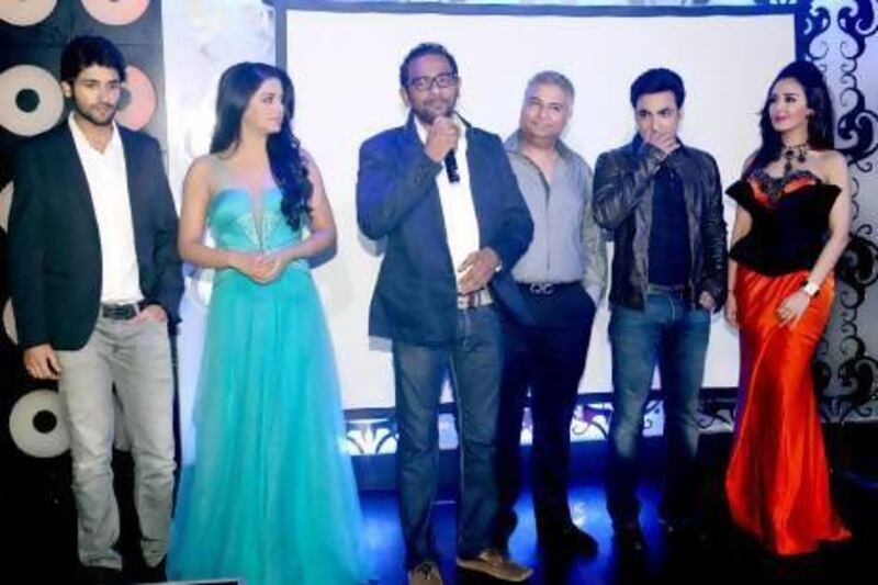 Sameer Khan, third from left, along with members of the cast, reveals details of his movie Dollars on Sunday. The movie will be shot in -Dubai, Ras Al Khaimah, Abu Dhabi, Iraq and India. Courtesy Times Square Entertainment