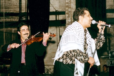 L-R: Simon Shaheen and Khaled performing as part of Desert Rose and Arabian Rhythms tour at the Beacon Theatre, New York in 2002. Banning Eyre for afropop.org