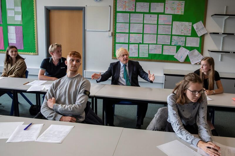 Britain's Prime Minister Boris Johnson visits Castle Rock school on the pupil's first day back to school, in Coalville, Britain August 26, 2020. Jack Hill/Pool via REUTERS