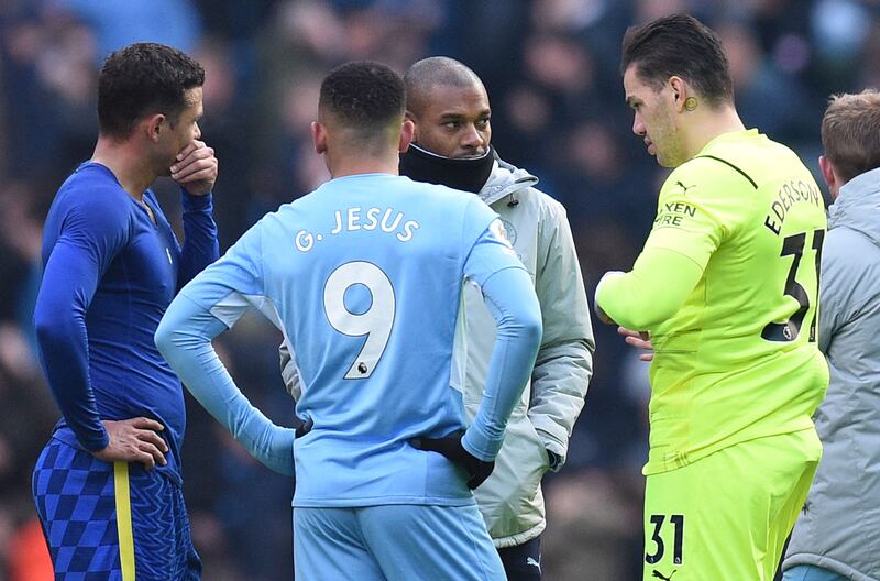 Chelsea's Brazilian defender Thiago Silva talks with Manchester City's Brazilian contingent Gabriel Jesus, Fernandinho and Ederson. AFP