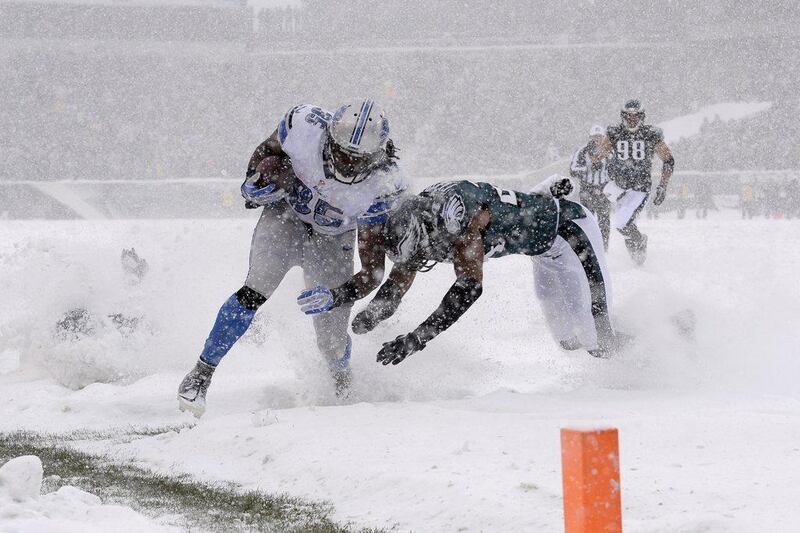 Detroit running back Joique Bell runs toward the end zone in Philadelphia. Michael Perez / AP