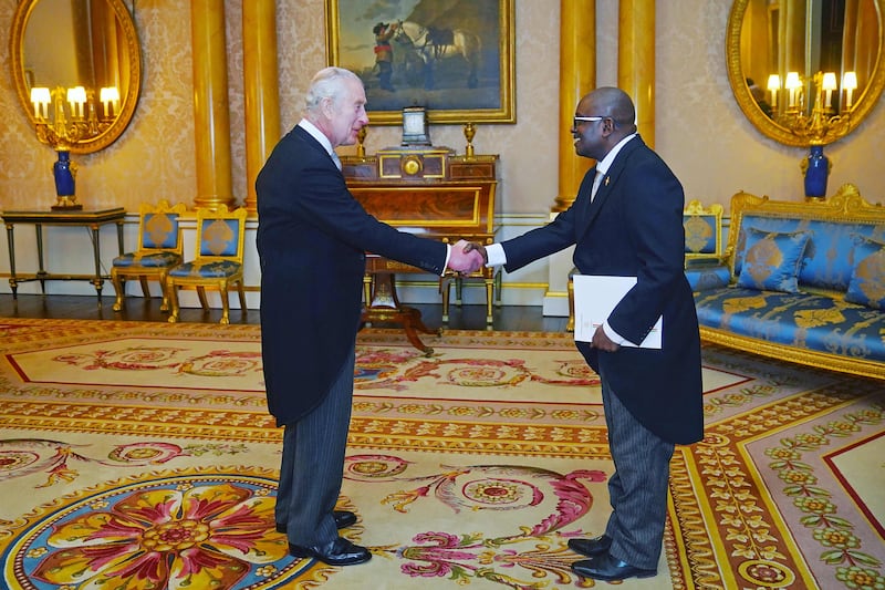 King Charles III, who is being treated for cancer, meets Burundi's ambassador in Britain, Epimeni Bapfinda, on Thursday. AFP