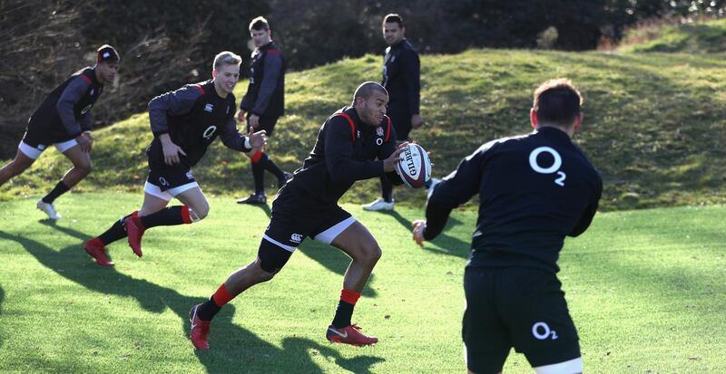 BAGSHOT, ENGLAND - FEBRUARY 07:  Jonathan Joseph runs with the ball during the England training session held at Pennyhill Park on February 7, 2018 in Bagshot, England.  (Photo by David Rogers/Getty Images)