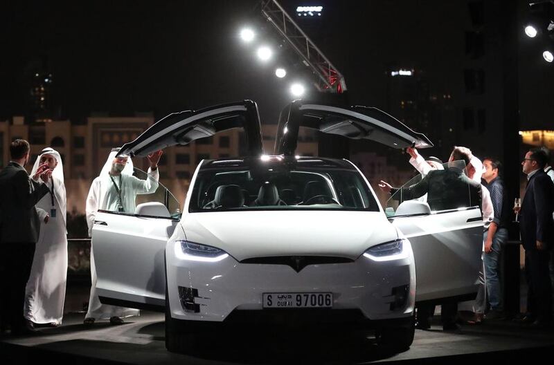 The number of eco-friendly cars, including Teslas, throughout the country is expected to rise. Karim Sahib / AFP