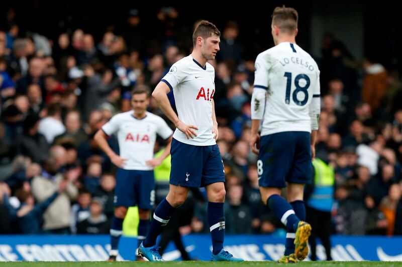 Tottenham Hotspur's Argentinian midfielder Giovani Lo Celso (R) and teammates react at the final whistle. AFP