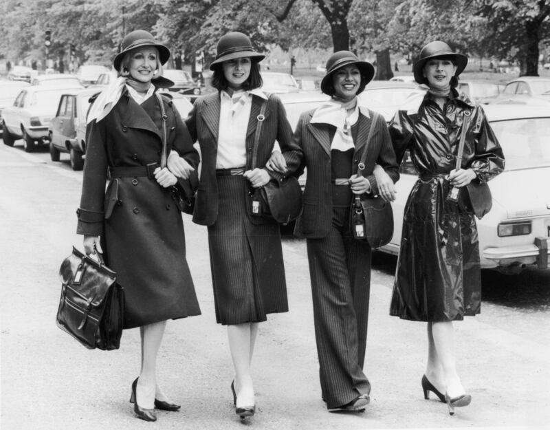 Models display the various styles of new uniform in 1977. Getty Images