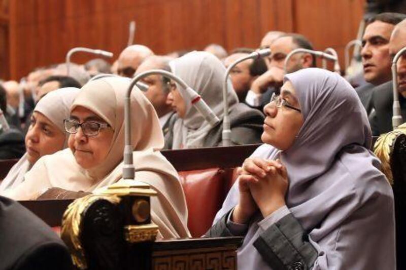 Female members of the Muslim Brotherhood’s Freedom and Justice Party (FJP) attend the first meeting of the Egyptian Shura Council after approving the new constitution.