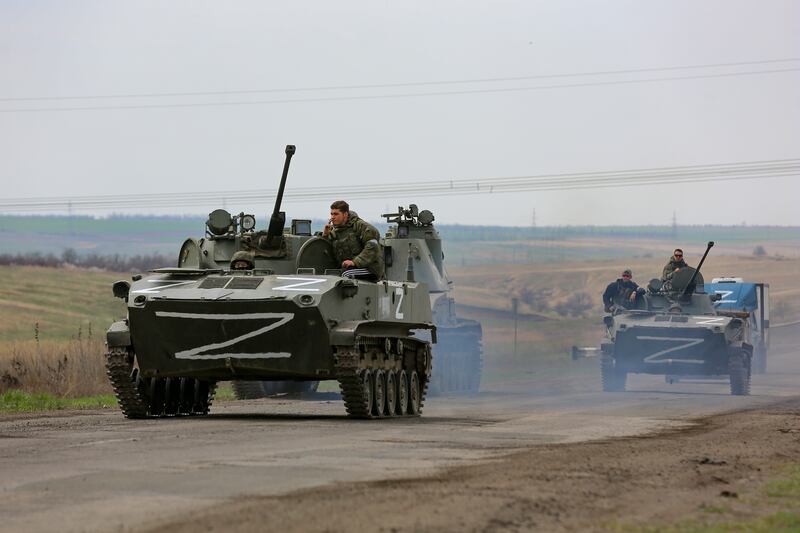 Russian military vehicles on a highway in an area controlled by Russian forces near Mariupol. AP