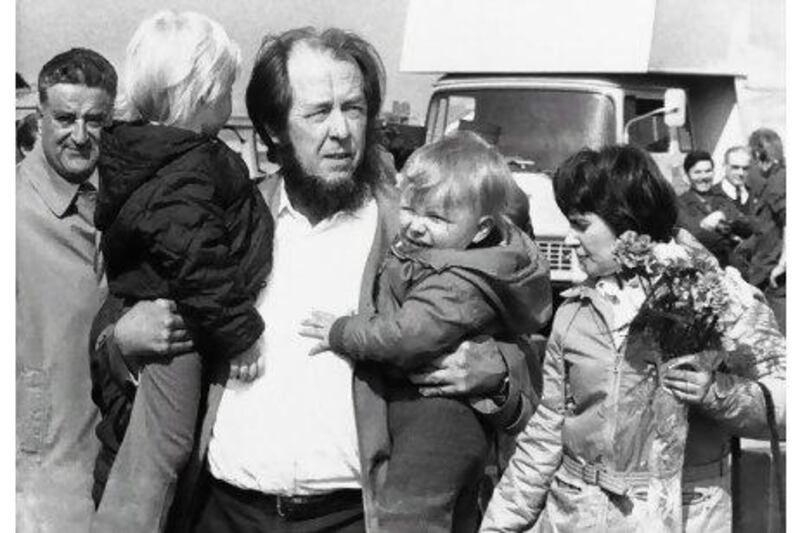 The exiled Soviet author Aleksandr Solzhenitsyn and his wife Natalya and sons Yermolai, left, and Ignat arrive in Zurich from the Soviet Union in 1974. Heinz Ducklau / AP Photo