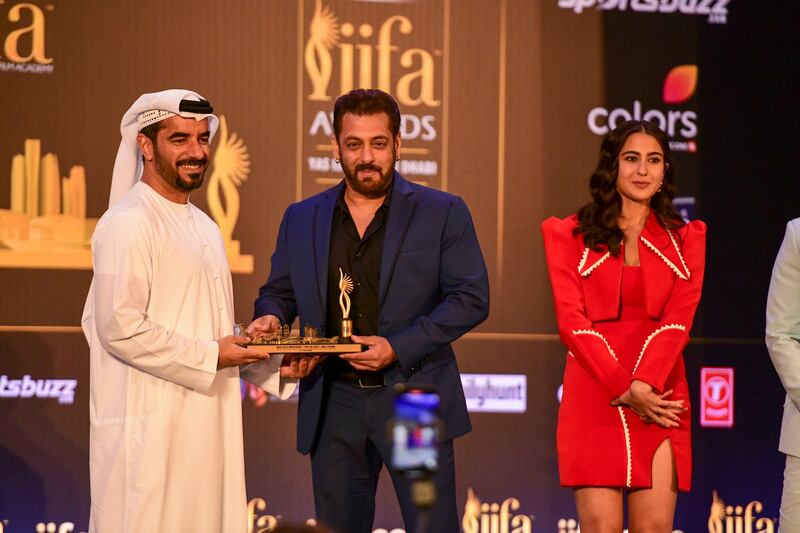 Salman Khan and Sara Ali Khan share the stage with Mohamed Abdalla Al Zaabi, chief executive of Miral. 