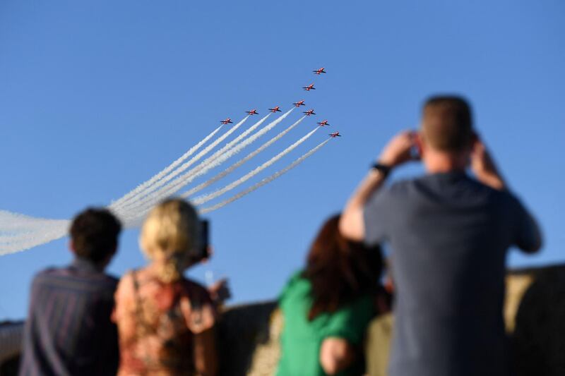 The Red Arrows fly over Carbis Bay and St Ives during the G7 summit. AFP