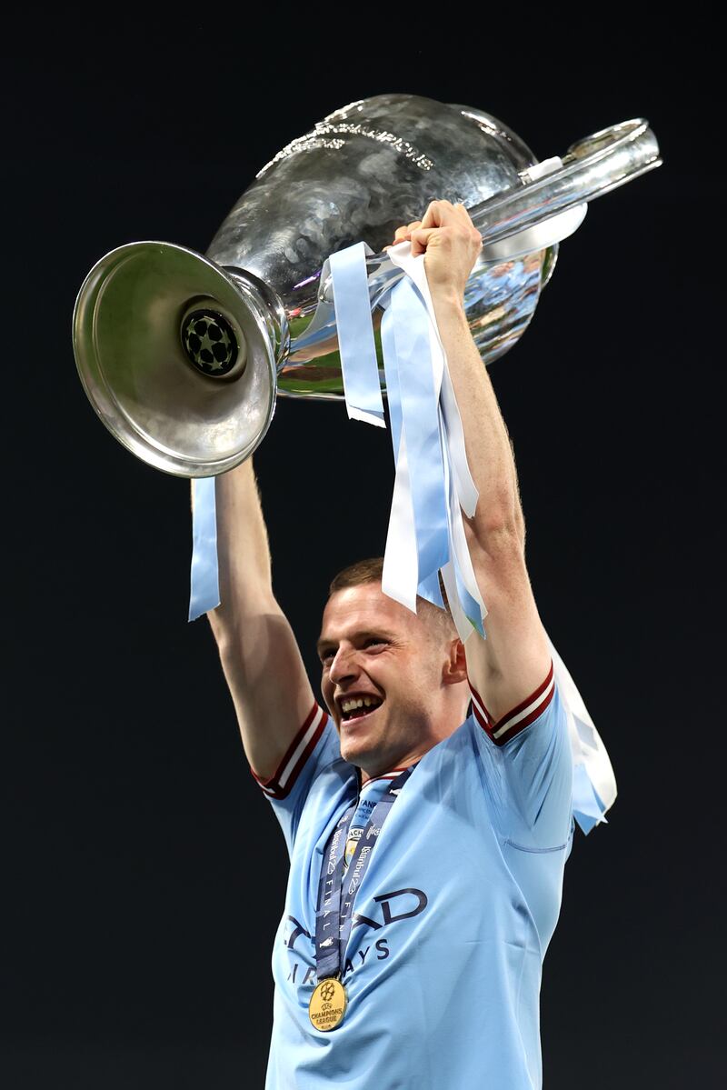 Sergio Gomez of Manchester City celebrates with the UEFA Champions League trophy after the team's victory in the UEFA Champions League 2022/23 final match between FC Internazionale and Manchester City FC at Atatuerk Olympic Stadium. Getty Images