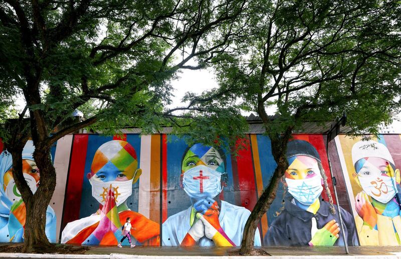 A mural by Brazilian artist Eduardo Kobra is dedicated to victims of the Covid-19, in Sao Paulo, Brazil, May 22. Covid-19 has now killed more than 1 million people in Latin America and the Caribbean. Getty