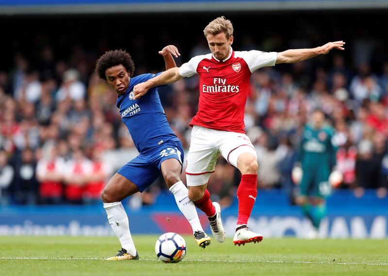 Left-back:  Nacho Monreal (Arsenal) – Part of an Arsenal defence who were shambolic at Anfield but far better as they kept Chelsea at bay to record a clean sheet at Stamford Bridge. John Sibley / Reuters