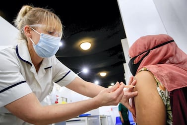 A woman receives an injection of the AstraZeneca vaccine at Elland Road vaccine centre in Leeds. Getty Images
