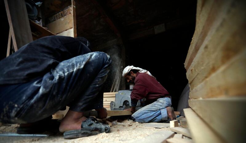 Yemeni labourers work at a wood shop on the International Labour Day, in Sanaa, Yemen. International Labour Day, or May Day, is observed annually on 1 May around the world and celebrates laborers, their rights, achievements and contributions to society. EPA