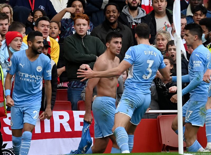 Rodri celebrates with his Manchester City teammates after scoring the winner against Arsenal on Saturday. EPA