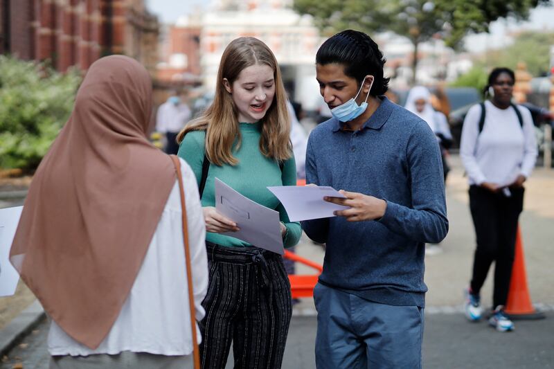 School leavers in Britain and those who studied A-Levels overseas will learn their results on Tuesday and find out whether they have places at UK universities. AFP