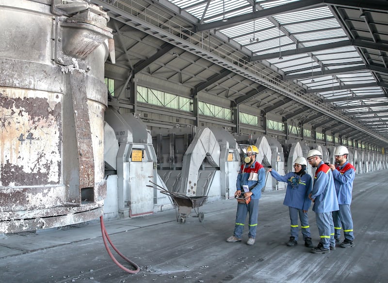Inside the carbon plant at Emirates Global Aluminium’s smelter in Abu Dhabi's Kezad. In the last quarter of the 2023, the emirate's economy grew by 4.1 per cent. Victor Besa / The National