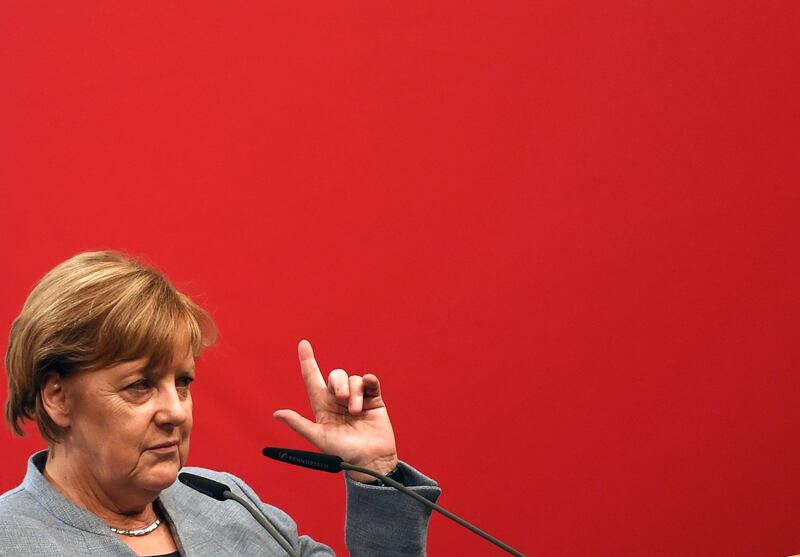 epa06264080 German Chancellor Angela Merkel speaks during a campaigning event of Christian Democratic Union (CDU), in Osnabrueck, Germany, 13 October 2017. Lower Saxony state elections in Germany are scheduled for 15 October.  EPA/DAVID HECKER