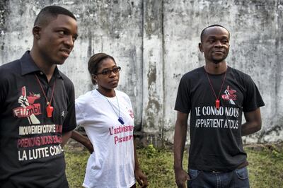 Left to right, Adonis Kabeya, 31; Audrey Kendra, 21; and Alain Mulumba Kabeya, 28;  of the Kinshasa cell of Filimbi, a pro-democracy group whose name means "whistle" in Swahili, at his home in Kinshasa, DRC, Aug. 14, 2018. After languishing nearly nine months in jail while they awaited a verdict, four of Filimbi's activists were recently convicted of “disturbing the public order” and “insulting the head of state” and sentenced to one year in prison.
