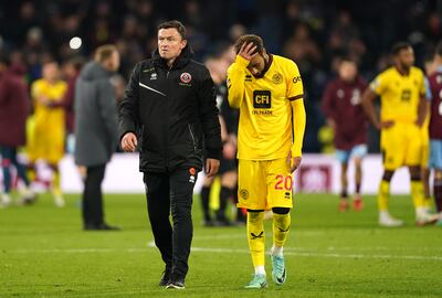 Sheffield United manager Paul Heckingbottom and Jayden Bogle after the heavy defeat against Burnley at Turf Moor. PA