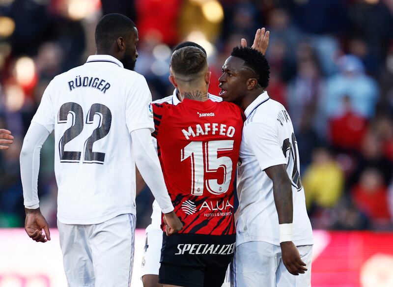 Real Madrid's Vinicius Junior and Antonio Rudiger argue with Mallorca's Pablo Maffeo. Reuters