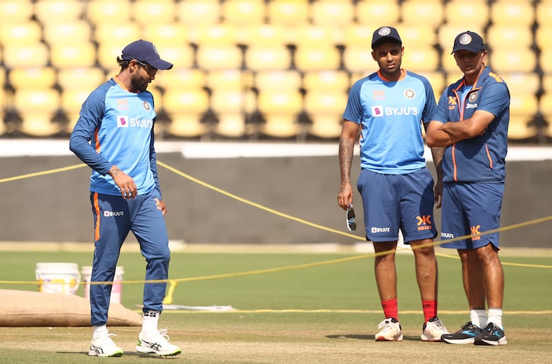 India coach Rahul Dravid and players inspect the Nagpur pitch. Getty