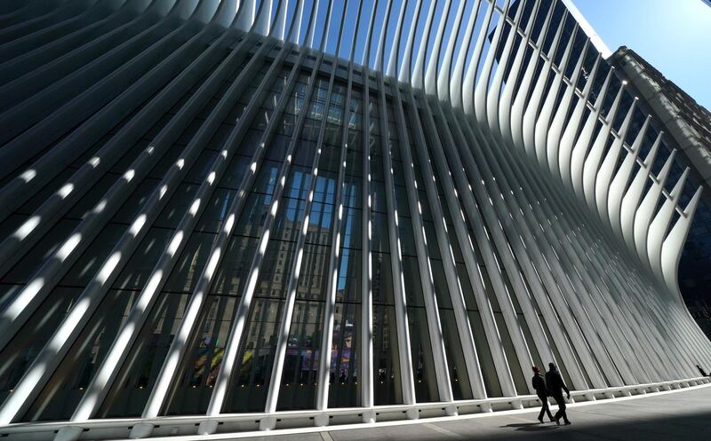 People walk past the Oculus, which serves as the centerpiece of the World Trade Center Transportation Hub in New York. AFP