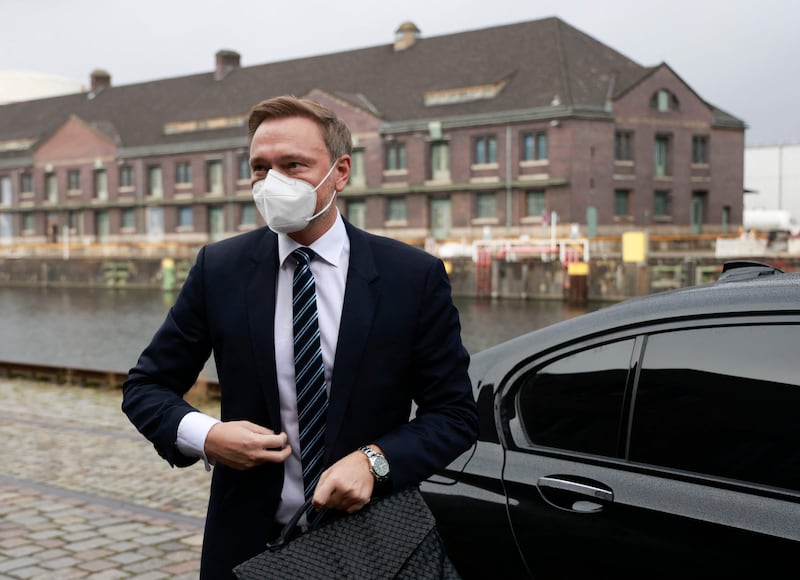 FDP leader Christian Lindner arrives for a final session of coalition talks in Berlin. AFP