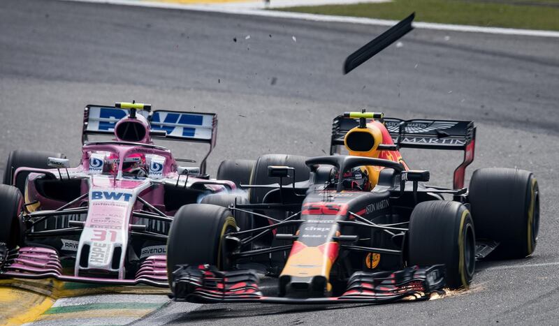 Max Verstappen, right, and Esteban Ocon collide. Getty Images